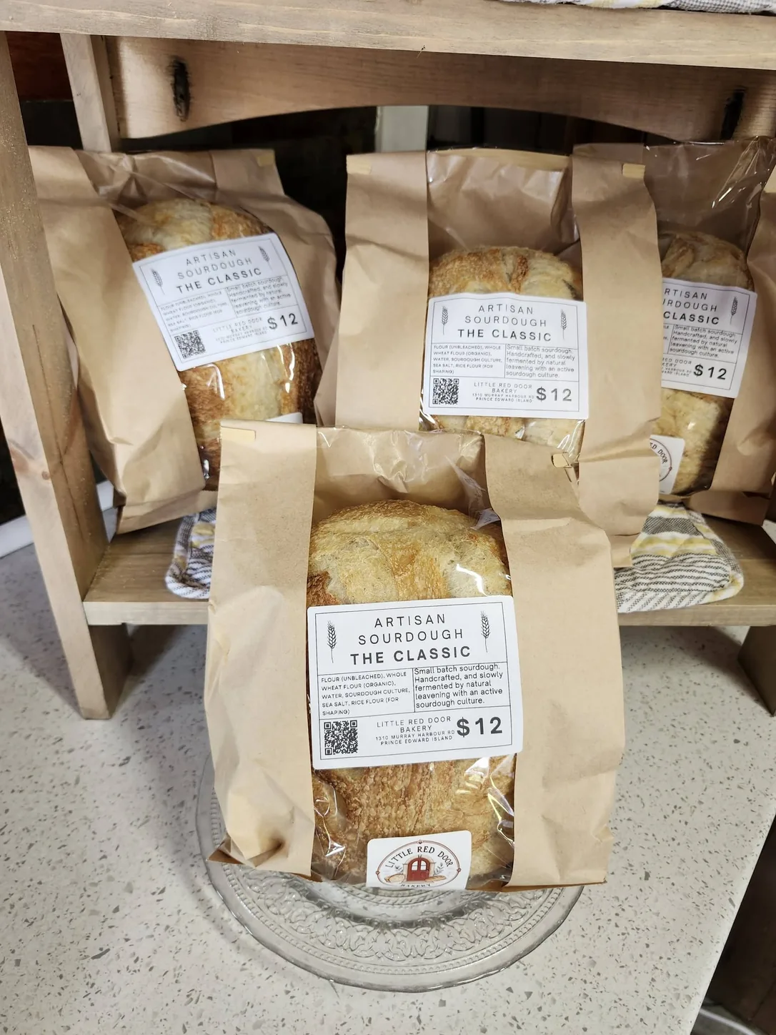 Bagged sourdough loaves on the Cottage Bakery Store shelf
